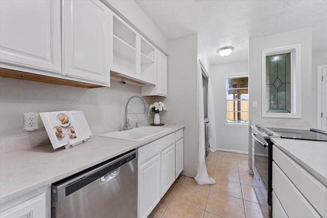 11731 Bexar Dr, La Porte, TX 77571 - kitchen featuring dishwasher, electric range oven, white cabinets, and light tile patterned flooring