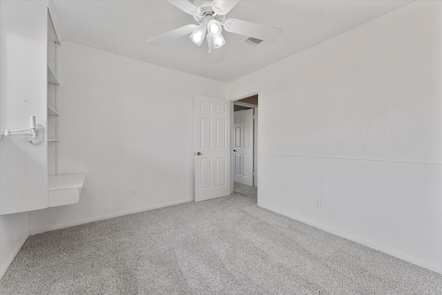11731 Bexar Dr, La Porte, TX 77571 - empty room featuring carpet flooring, a ceiling fan, and baseboards