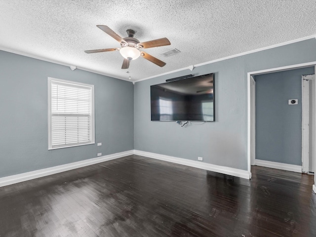 809 18th Ave N, Texas City, TX 77590 - empty room featuring a textured ceiling, a ceiling fan, wood finished floors, baseboards, and ornamental molding