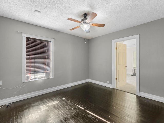 809 18th Ave N, Texas City, TX 77590 - unfurnished room featuring a ceiling fan, wood-type flooring, baseboards, and a textured ceiling
