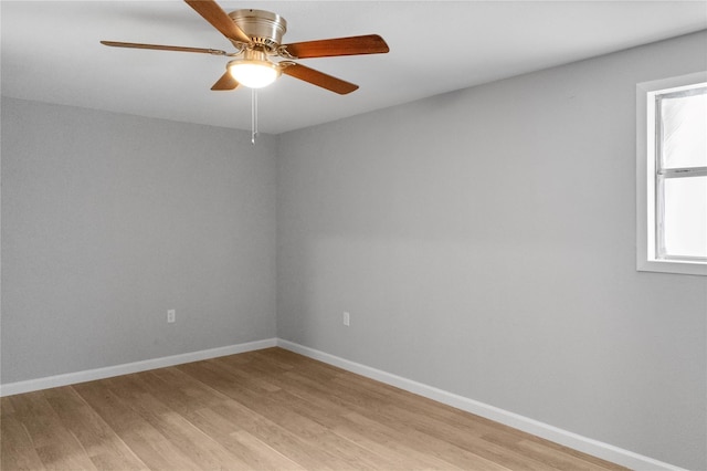 10118 Norvic St, Houston, TX 77029 - unfurnished room with light wood-type flooring, baseboards, and a ceiling fan