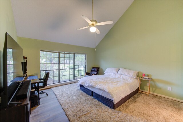 3402 Deeds Rd, Houston, TX 77084 - bedroom featuring high vaulted ceiling, an office area, wood finished floors, baseboards, and ceiling fan
