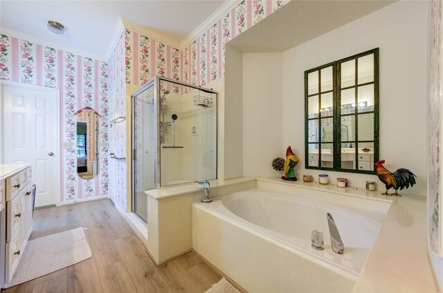 3402 Deeds Rd, Houston, TX 77084 - full bath with wallpapered walls, crown molding, a stall shower, a bath, and vanity