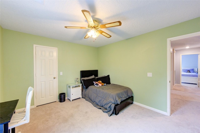 3402 Deeds Rd, Houston, TX 77084 - bedroom with carpet, ceiling fan, and baseboards