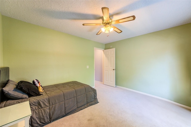 3402 Deeds Rd, Houston, TX 77084 - carpeted bedroom featuring baseboards and ceiling fan