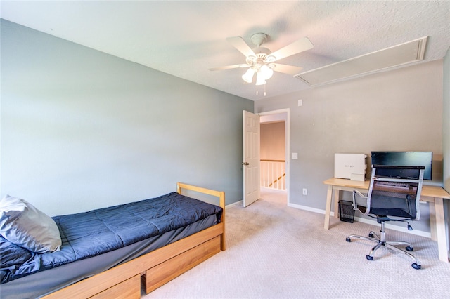 3402 Deeds Rd, Houston, TX 77084 - carpeted bedroom with attic access, baseboards, and a ceiling fan