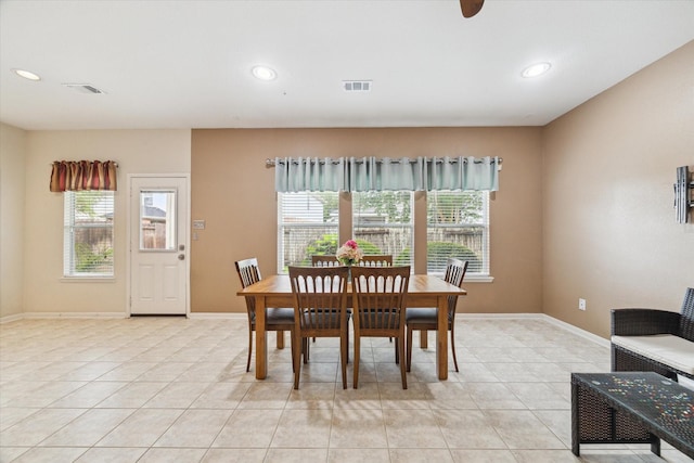 21551 Elm Hurst Ln, Katy, TX 77450 - dining space with light tile patterned floors, plenty of natural light, recessed lighting, and baseboards