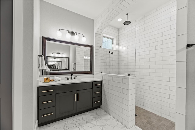 19307 Spillway Overlook Cir, Cypress, TX 77433 - bathroom featuring tiled shower, vanity, and tile patterned floors