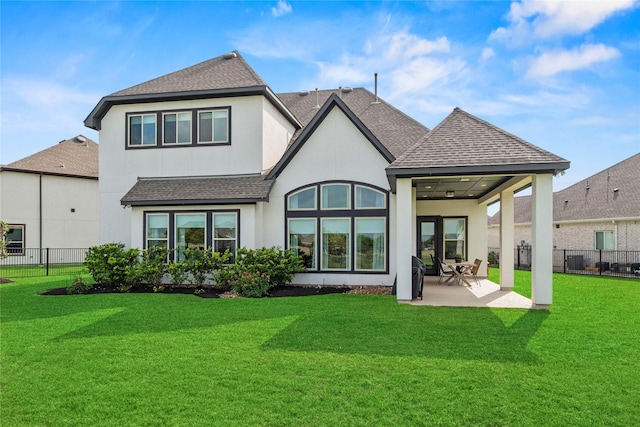19307 Spillway Overlook Cir, Cypress, TX 77433 - back of property with roof with shingles, a patio, and stucco siding