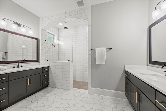 19307 Spillway Overlook Cir, Cypress, TX 77433 - full bath featuring two vanities, walk in shower, and tile patterned floors