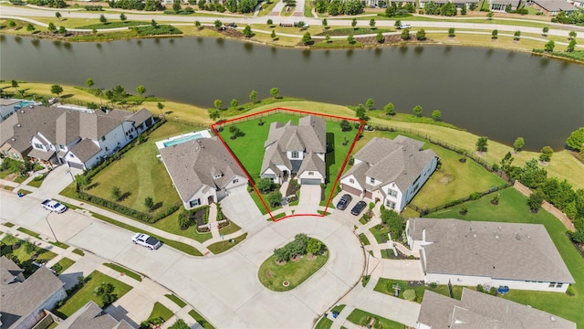 19307 Spillway Overlook Cir, Cypress, TX 77433 - aerial view of residential area with a nearby body of water and property parcel outlined