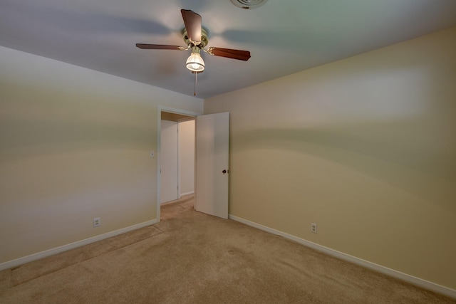 906 Carlee Dr, Brenham, TX 77833 - unfurnished room featuring light colored carpet, baseboards, and a ceiling fan