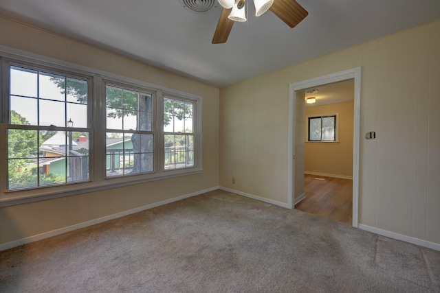 906 Carlee Dr, Brenham, TX 77833 - unfurnished room featuring carpet flooring, a ceiling fan, and baseboards