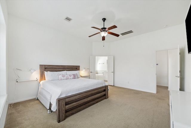 19726 Terrace Cliff Ct, Richmond, TX 77407 - bedroom featuring light colored carpet, ceiling fan, ensuite bath, and baseboards