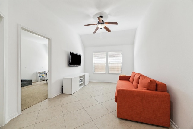 19726 Terrace Cliff Ct, Richmond, TX 77407 - living area featuring a ceiling fan, vaulted ceiling, baseboards, and light tile patterned flooring