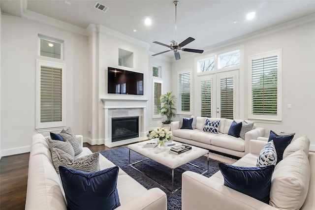 1811 Upland Lks, Houston, TX 77043 - living room with ceiling fan, dark wood-type flooring, recessed lighting, ornamental molding, and a glass covered fireplace