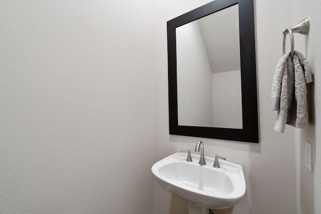 1811 Upland Lks, Houston, TX 77043 - bathroom with a sink and vaulted ceiling