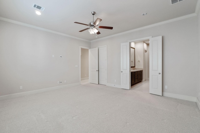 1811 Upland Lks, Houston, TX 77043 - unfurnished bedroom featuring baseboards, crown molding, light colored carpet, connected bathroom, and a ceiling fan