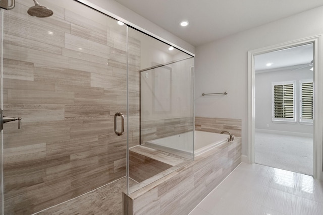 1811 Upland Lks, Houston, TX 77043 - bathroom featuring a stall shower, a bath, tile patterned flooring, and recessed lighting