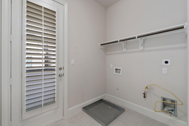 1811 Upland Lks, Houston, TX 77043 - laundry room with hookup for a gas dryer, washer hookup, electric dryer hookup, and baseboards