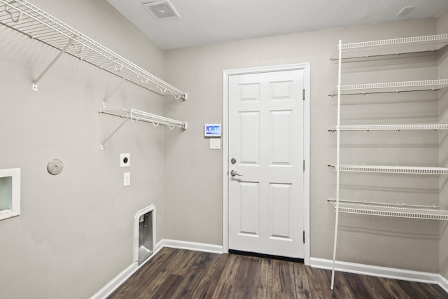 4522 Woodspring Glen Ln, Houston, TX 77345 - laundry area featuring baseboards, electric dryer hookup, wood finished floors, and hookup for a gas dryer