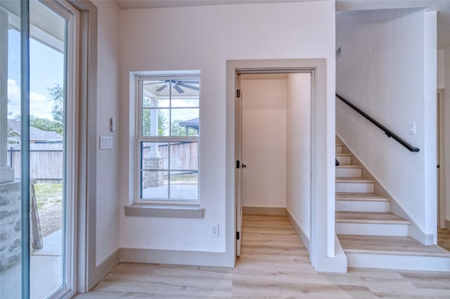 6 Rio Seco Dr, Uvalde, TX 78801 - entryway with light wood-style floors, stairway, and a ceiling fan