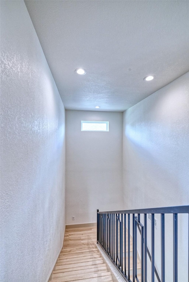 6 Rio Seco Dr, Uvalde, TX 78801 - stairs featuring wood finished floors and recessed lighting