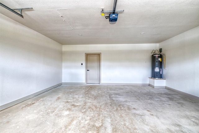 6 Rio Seco Dr, Uvalde, TX 78801 - garage featuring water heater and a garage door opener