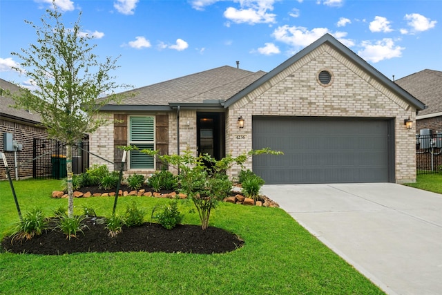 4236 Waterlily Spring Way, Porter, TX 77365 - view of front of house featuring concrete driveway, a garage, brick siding, and a shingled roof