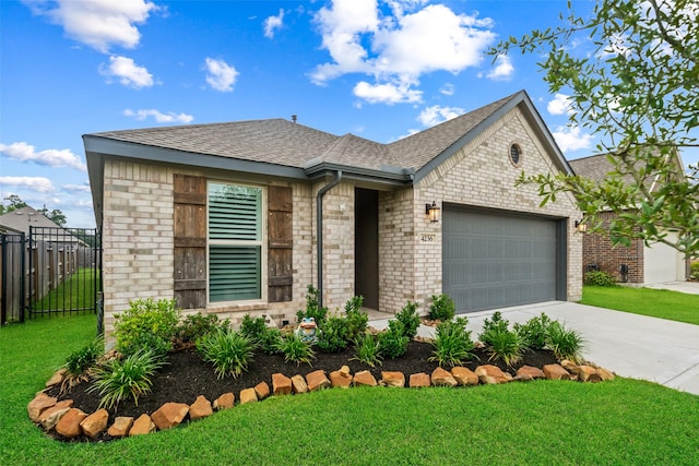 4236 Waterlily Spring Way, Porter, TX 77365 - view of front facade featuring an attached garage, driveway, a shingled roof, and brick siding