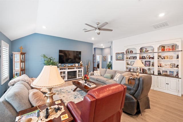 4236 Waterlily Spring Way, Porter, TX 77365 - living room with light wood-style flooring, a ceiling fan, recessed lighting, and vaulted ceiling