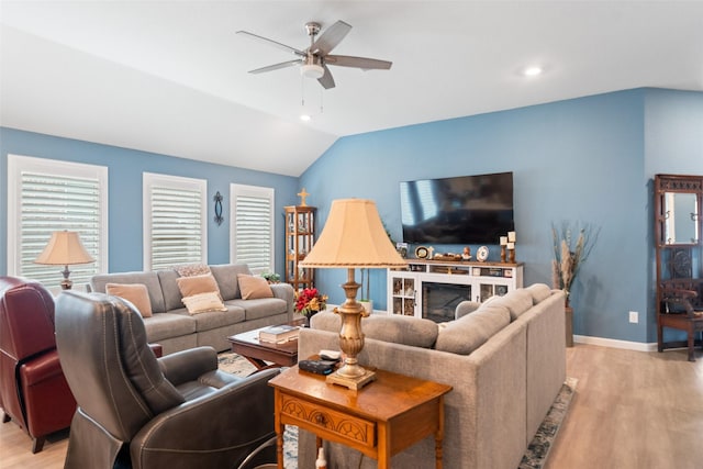 4236 Waterlily Spring Way, Porter, TX 77365 - living area with ceiling fan, light wood-style floors, lofted ceiling, baseboards, and recessed lighting
