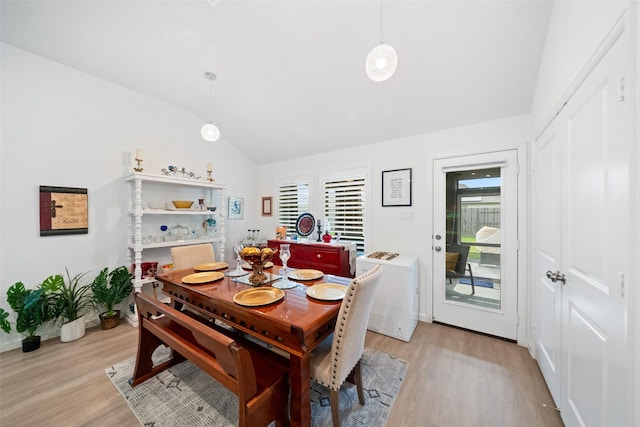 4236 Waterlily Spring Way, Porter, TX 77365 - dining room with vaulted ceiling, light wood-style flooring, healthy amount of natural light, and baseboards