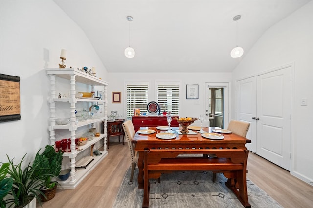 4236 Waterlily Spring Way, Porter, TX 77365 - dining area with lofted ceiling and light wood finished floors