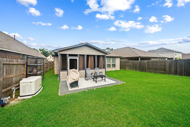 4236 Waterlily Spring Way, Porter, TX 77365 - rear view of house with a patio area, brick siding, and a sunroom