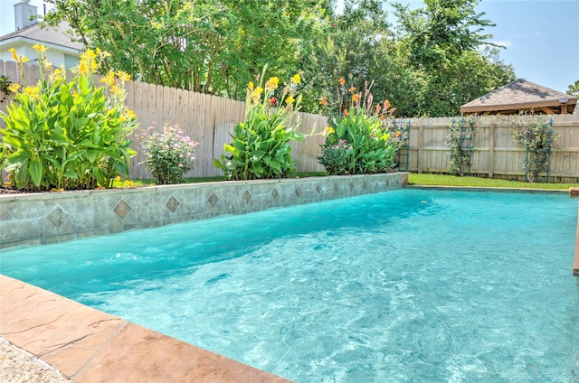 19927 Maple Village Dr, Cypress, TX 77433 - view of pool with a fenced backyard