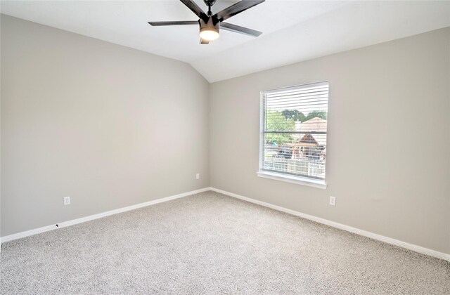 19927 Maple Village Dr, Cypress, TX 77433 - carpeted empty room featuring ceiling fan, baseboards, and vaulted ceiling