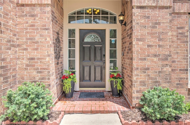 19927 Maple Village Dr, Cypress, TX 77433 - view of exterior entry featuring brick siding
