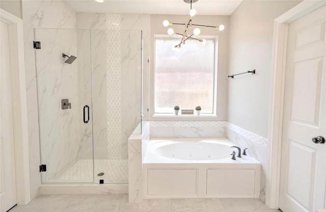 19927 Maple Village Dr, Cypress, TX 77433 - full bathroom with a jetted tub, a marble finish shower, and a chandelier