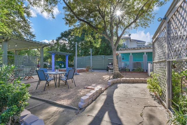 1513 19th St, Galveston, TX 77550 - view of patio featuring a pergola and outdoor dining space