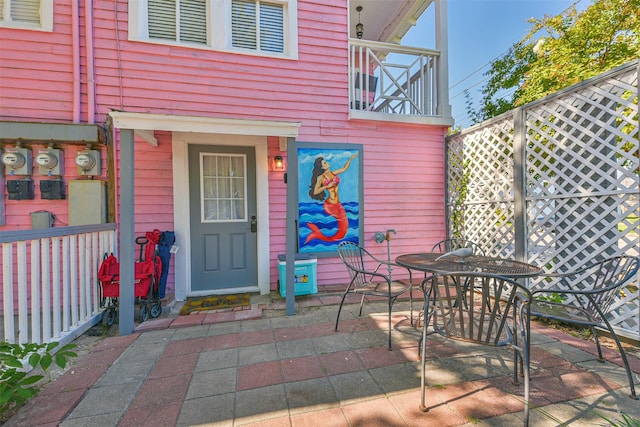 1513 19th St, Galveston, TX 77550 - view of patio with outdoor dining area