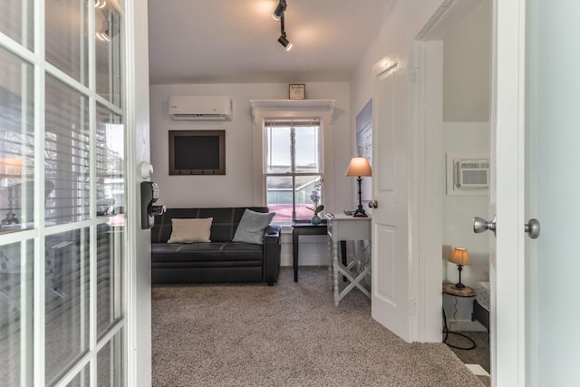 1513 19th St, Galveston, TX 77550 - carpeted living room with a wall mounted air conditioner and track lighting