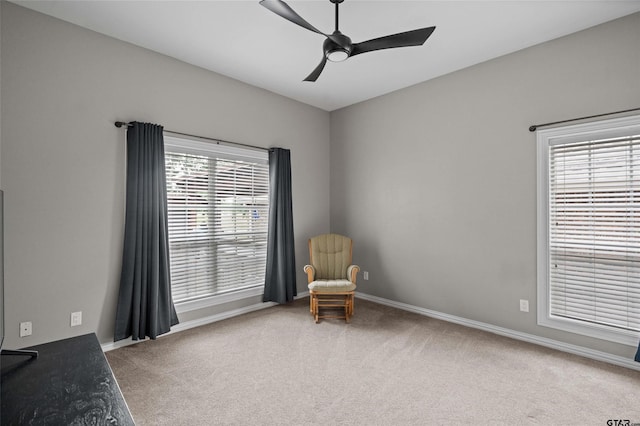420 Bunker Dr, Tyler, TX 75703 - living area with carpet floors, a ceiling fan, and baseboards