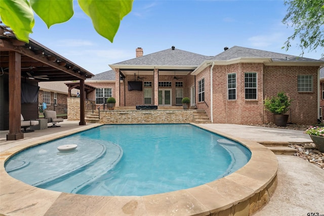 420 Bunker Dr, Tyler, TX 75703 - outdoor pool with ceiling fan, a patio area, and french doors