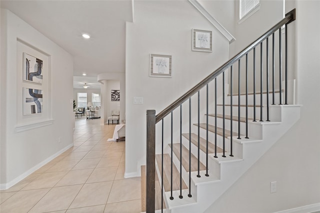 6531 Cody Mountain Trl, Richmond, TX 77407 - stairway featuring tile patterned floors, recessed lighting, and baseboards