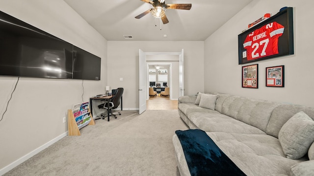 5903 Red River Dr, Manvel, TX 77578 - carpeted living area featuring a ceiling fan, an office area, and baseboards