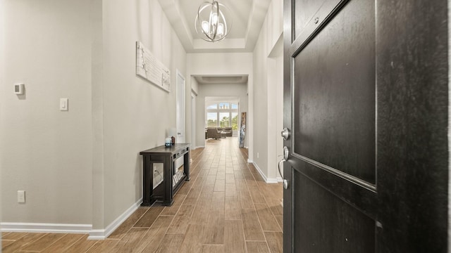 5903 Red River Dr, Manvel, TX 77578 - entryway with wood finished floors, a chandelier, and baseboards