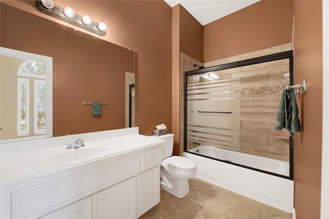 2005 Mistwood Ct, Pearland, TX 77584 - full bathroom with toilet, vanity, combined bath / shower with glass door, and tile patterned flooring