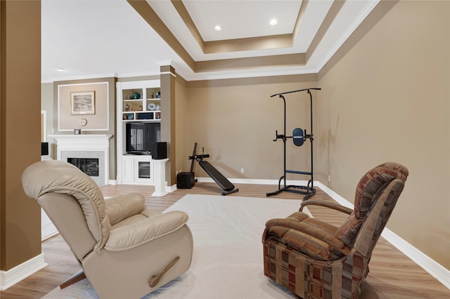 2005 Mistwood Ct, Pearland, TX 77584 - living area with wood finished floors, baseboards, a fireplace, recessed lighting, and ornamental molding