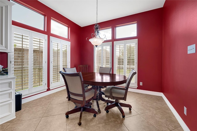 2005 Mistwood Ct, Pearland, TX 77584 - dining room featuring baseboards and light tile patterned flooring